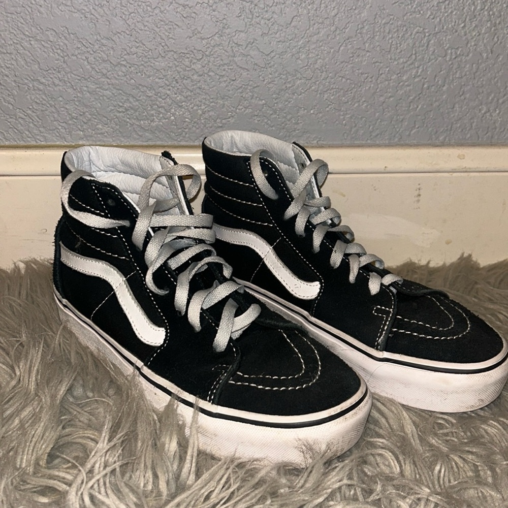 Black and white high top vans with platform